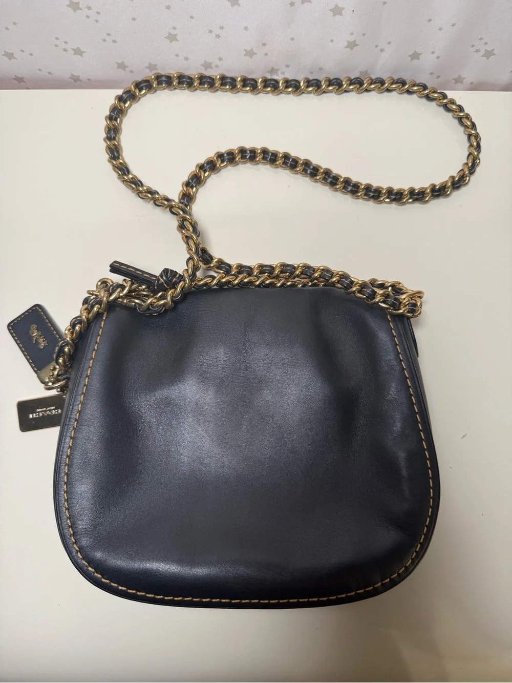 COACH 1941 Black Turnlock Crossbody Saddle Bag.